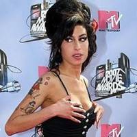 Amy Winehouse showed off her healthy skin in London.