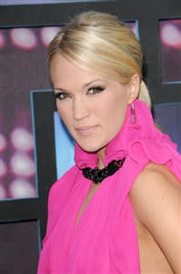 Carrie Underwood switched hairstyles at the CMT Awards. 