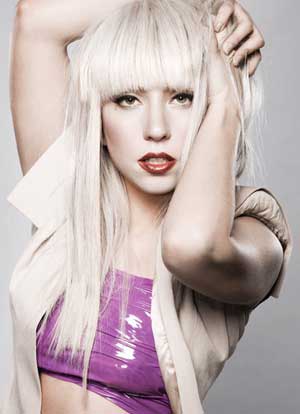 Lady Gaga's long yellow blonde hairstyle with curls,