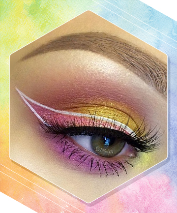 Graphic White Eyeliner Over Colorful Eyeshadow