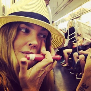 Drew Barrymore Shows She Can Apply Makeup on the Subway with the Best of Us