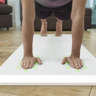 A Yoga Mat That Offers Tips? Yes, Please