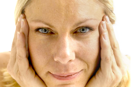 6 Face Yoga Poses That'll Make You Look Like You Had a Facelift
