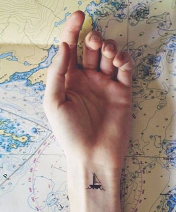 Small paper boat tattoo by Philipp Eid  Tattoogridnet