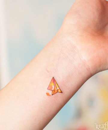 origami plane tattoo