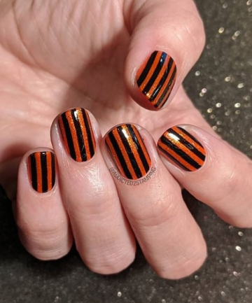 Black and Orange Striped Nails