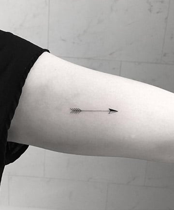 Minimalist Arrow Tattoo on Bicep