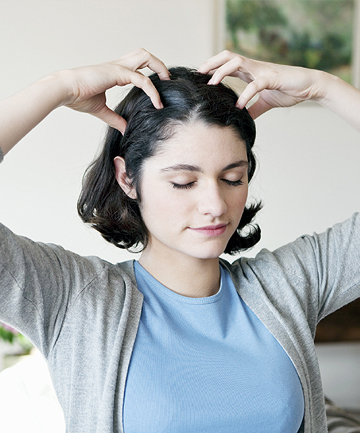 Massage scalp with essential oil