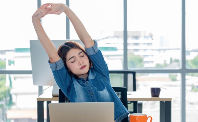 4 Super Easy Shoulder Stretches You Can Do Right From Your Desk