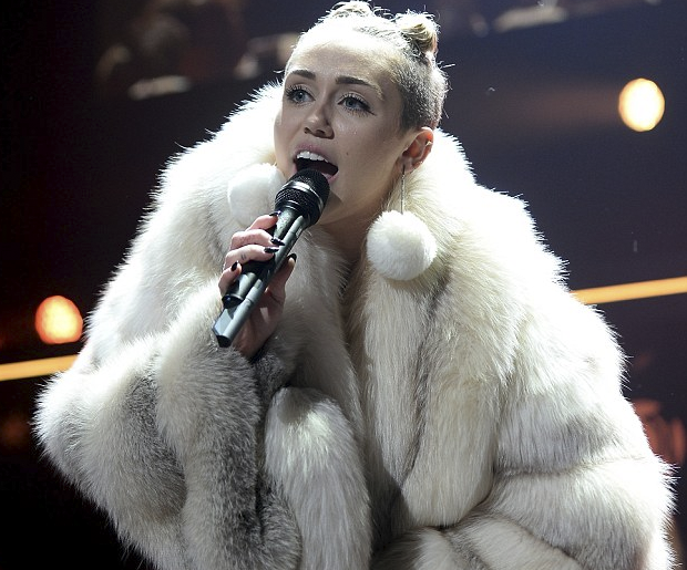 Miley Cyrus Angers Twitter Followers With Her Furry Fashion Choice